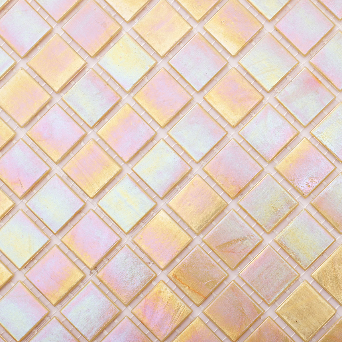 Close-up view of pearlescent bright yellow square glass mosaic tiles