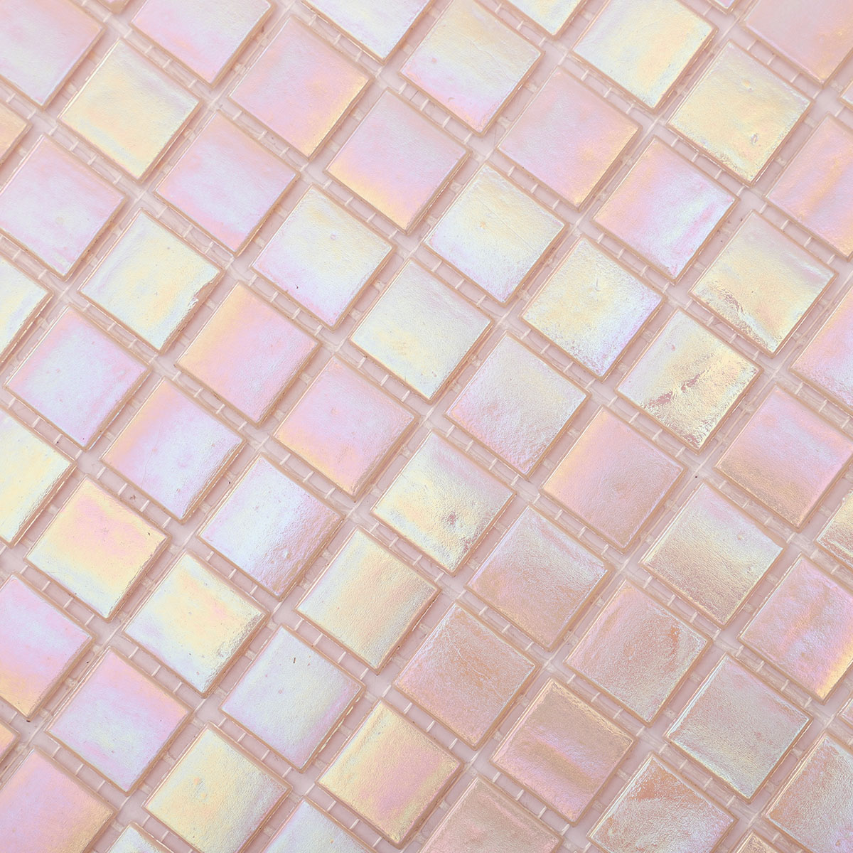Close-up view of rose pink square glass mosaic tiles