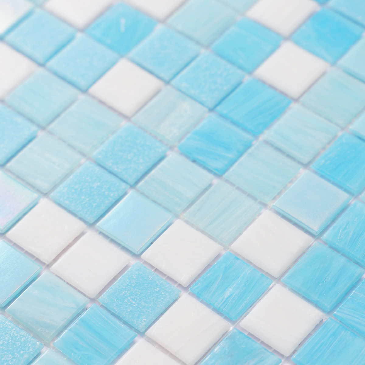 Close-up of glossy aqua blue glass mosaic tiles