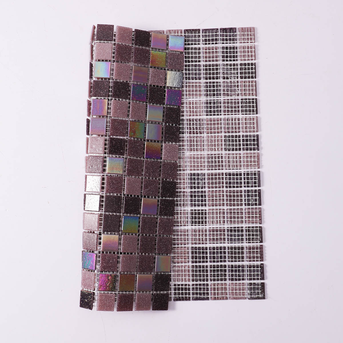 Folded back side of purple uniform square glass mosaic tile