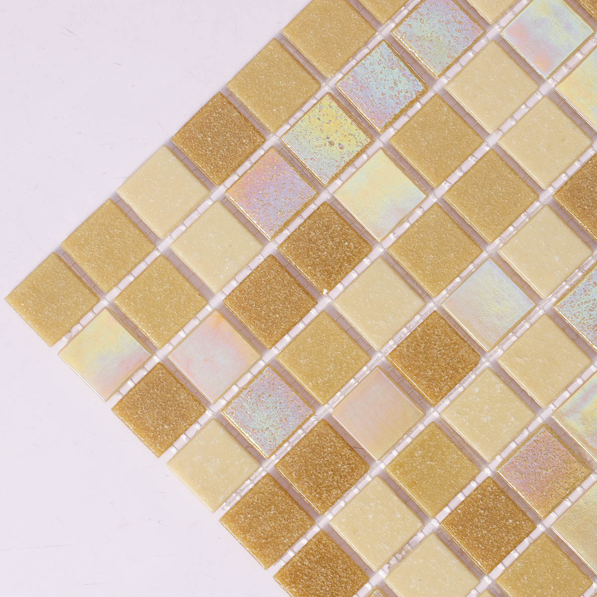 Side close-up of mixed yellow square glass mosaic tiles
