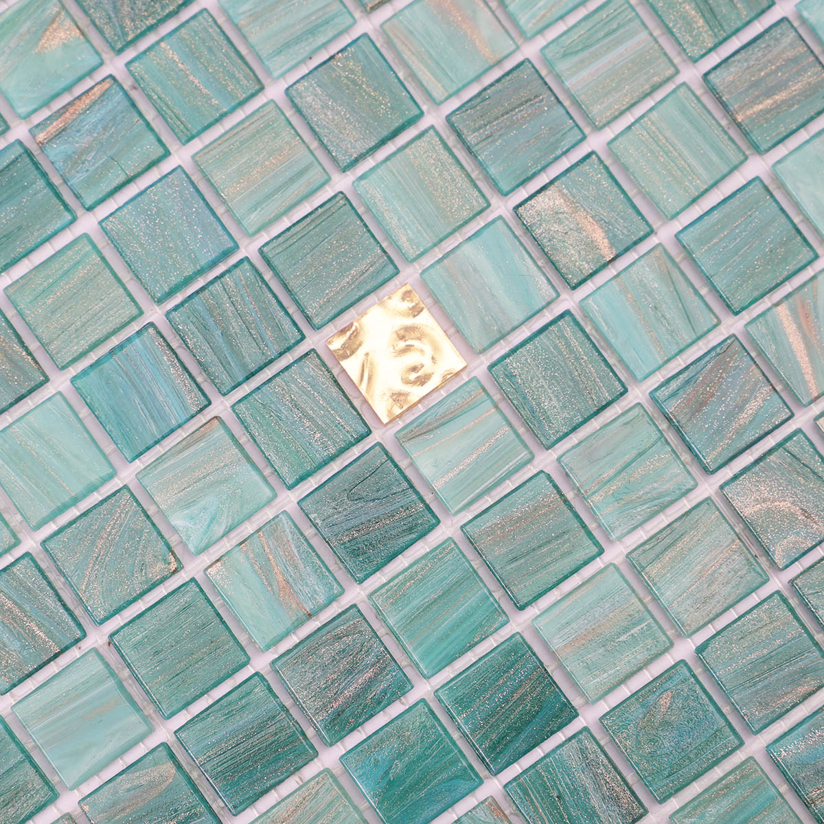 Close-up of green and gold glass mosaic tiles