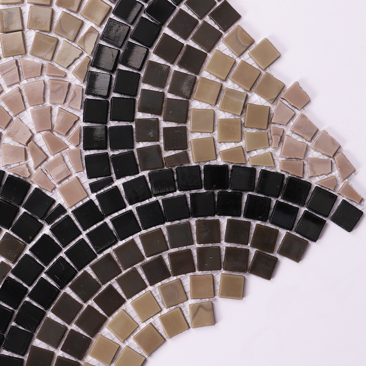 Detailed close-up of hand-cut scale glass mosaic artwork tiles