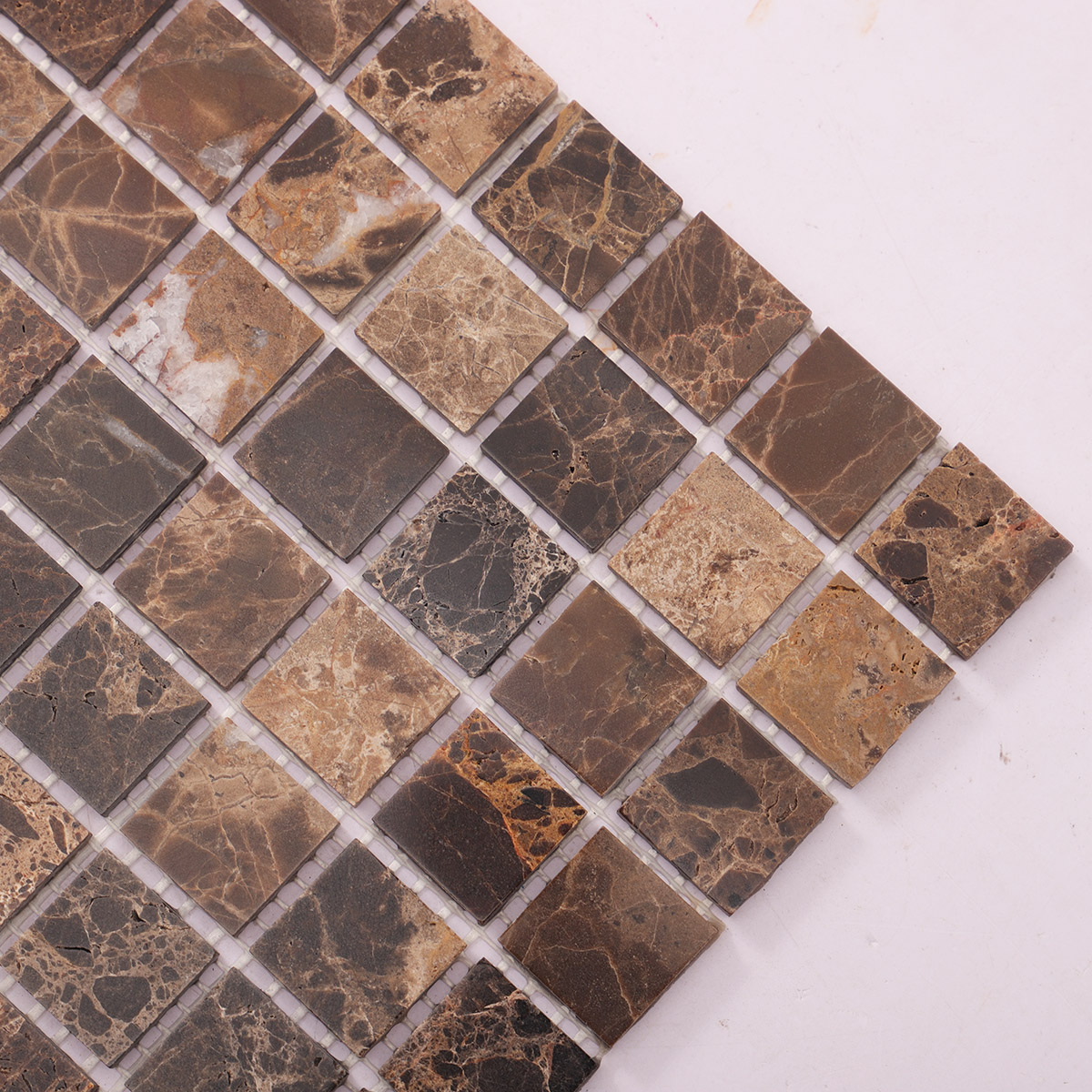 Close-up of dark brown mosaic marble tiles