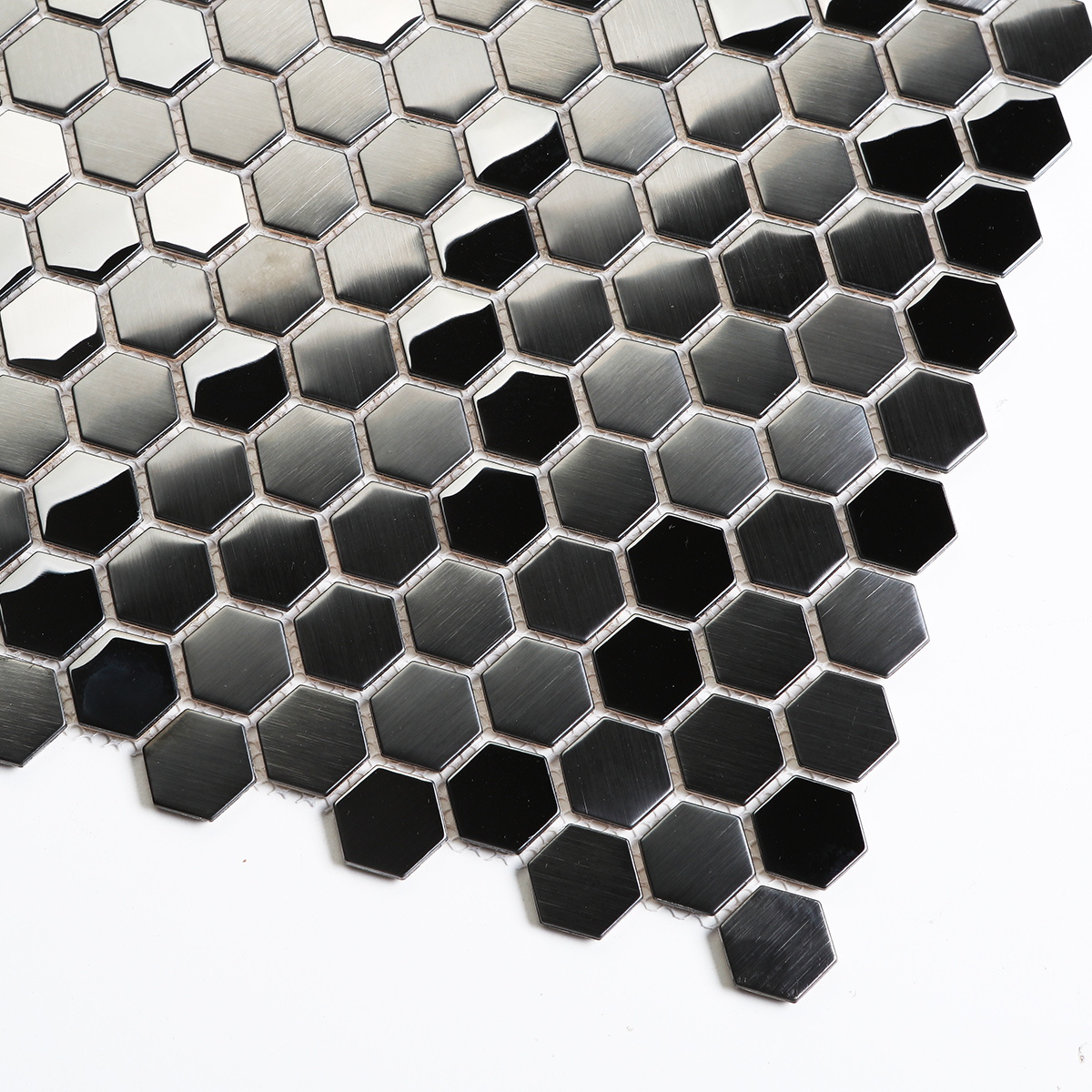 Detailed close-up of black stainless steel hexagon mosaic tiles.
