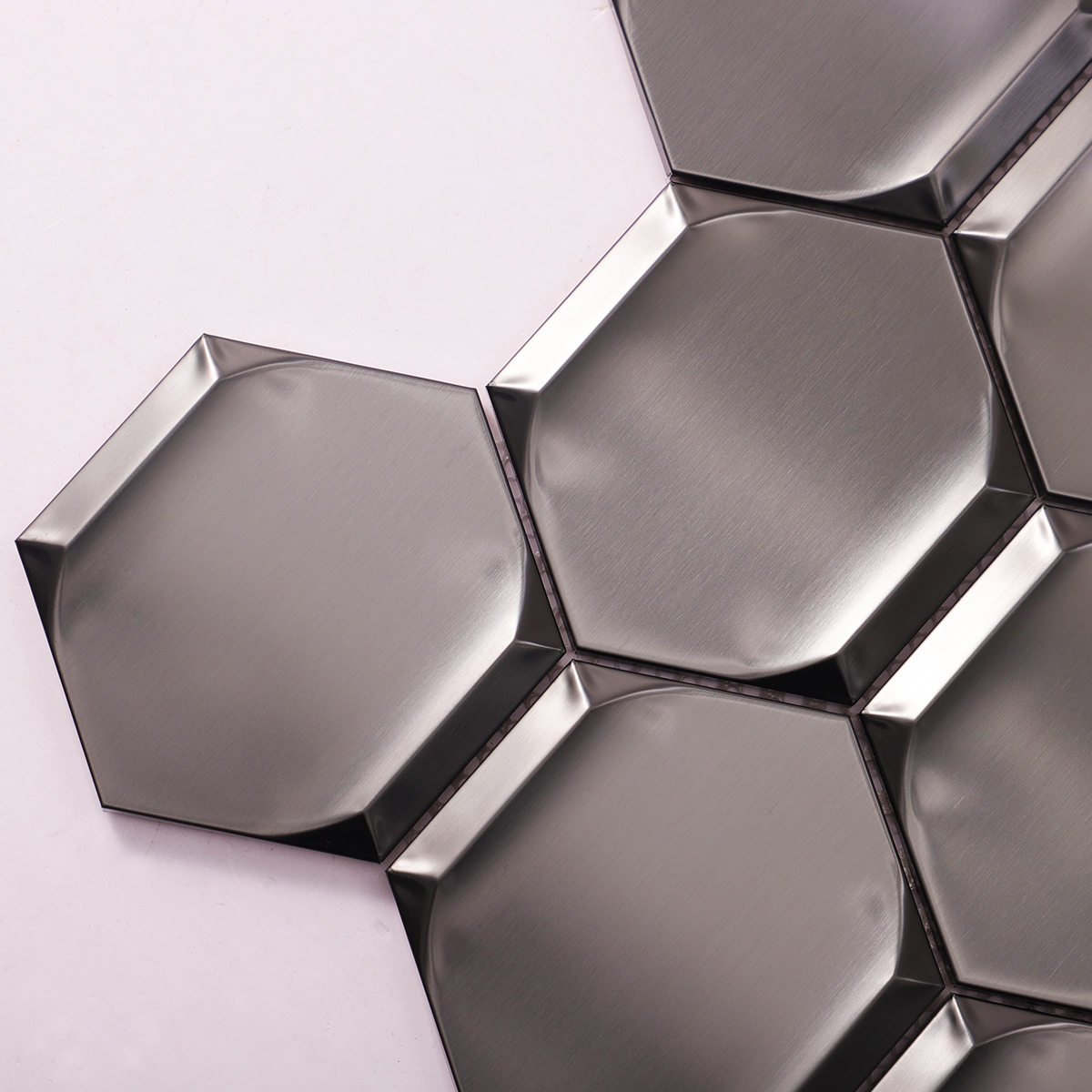 Detailed close-up of 3D black hexagon metal mosaic tiles.