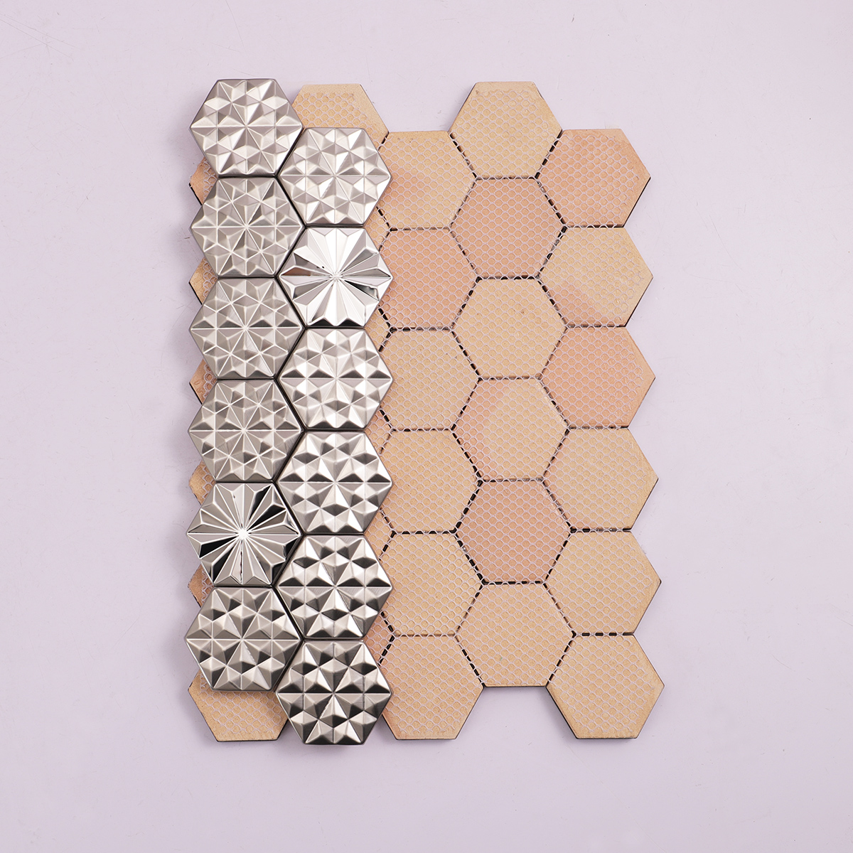Folded back side of silver hexagon 3D metal mosaic tiles.