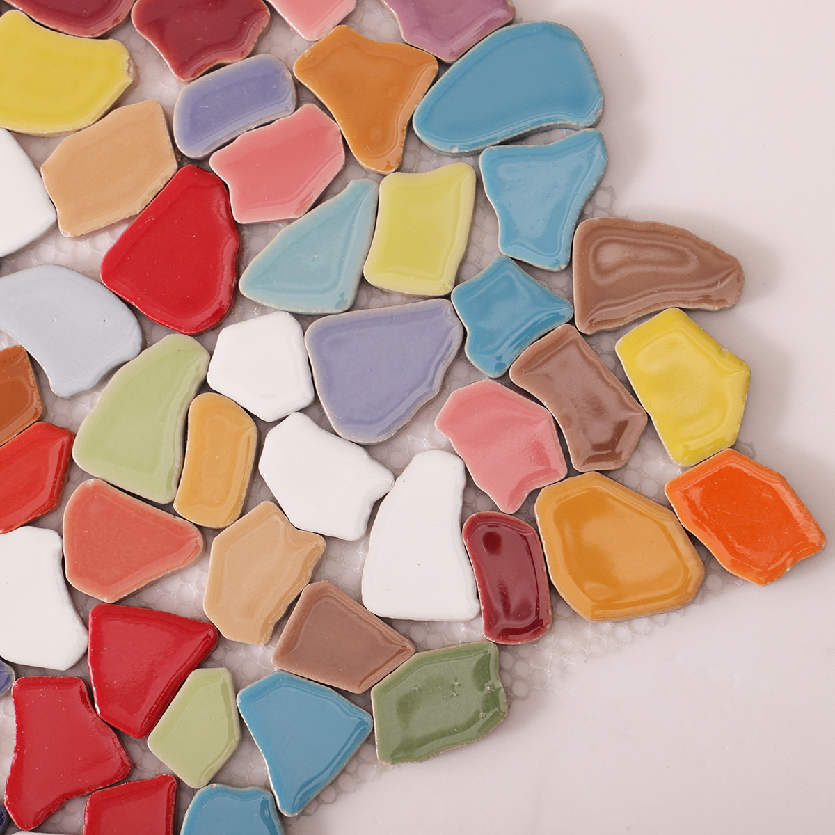 Close-up of colorful broken ceramic mosaic tiles 