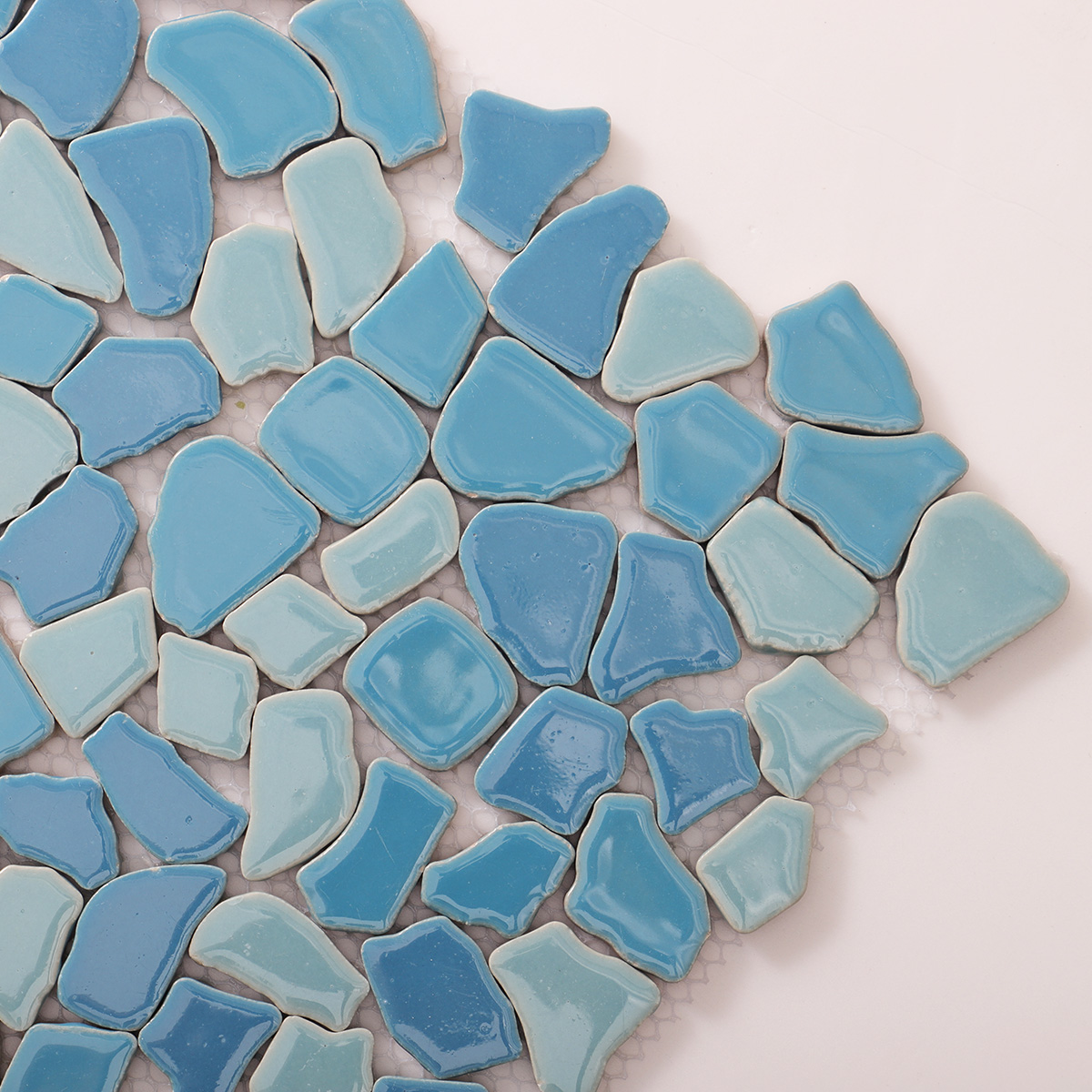 Detailed close-up of ceramic cracked mosaic tiles