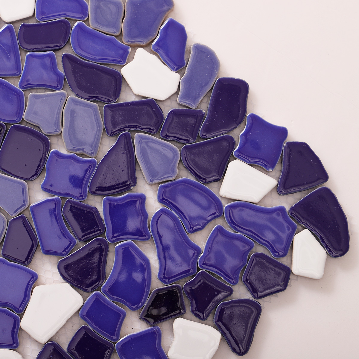 Close-up of blue broken ceramic mosaic tiles