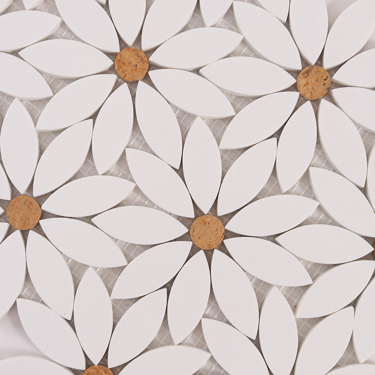 Close-up of white waterjet sunflower marble mosaic tiles