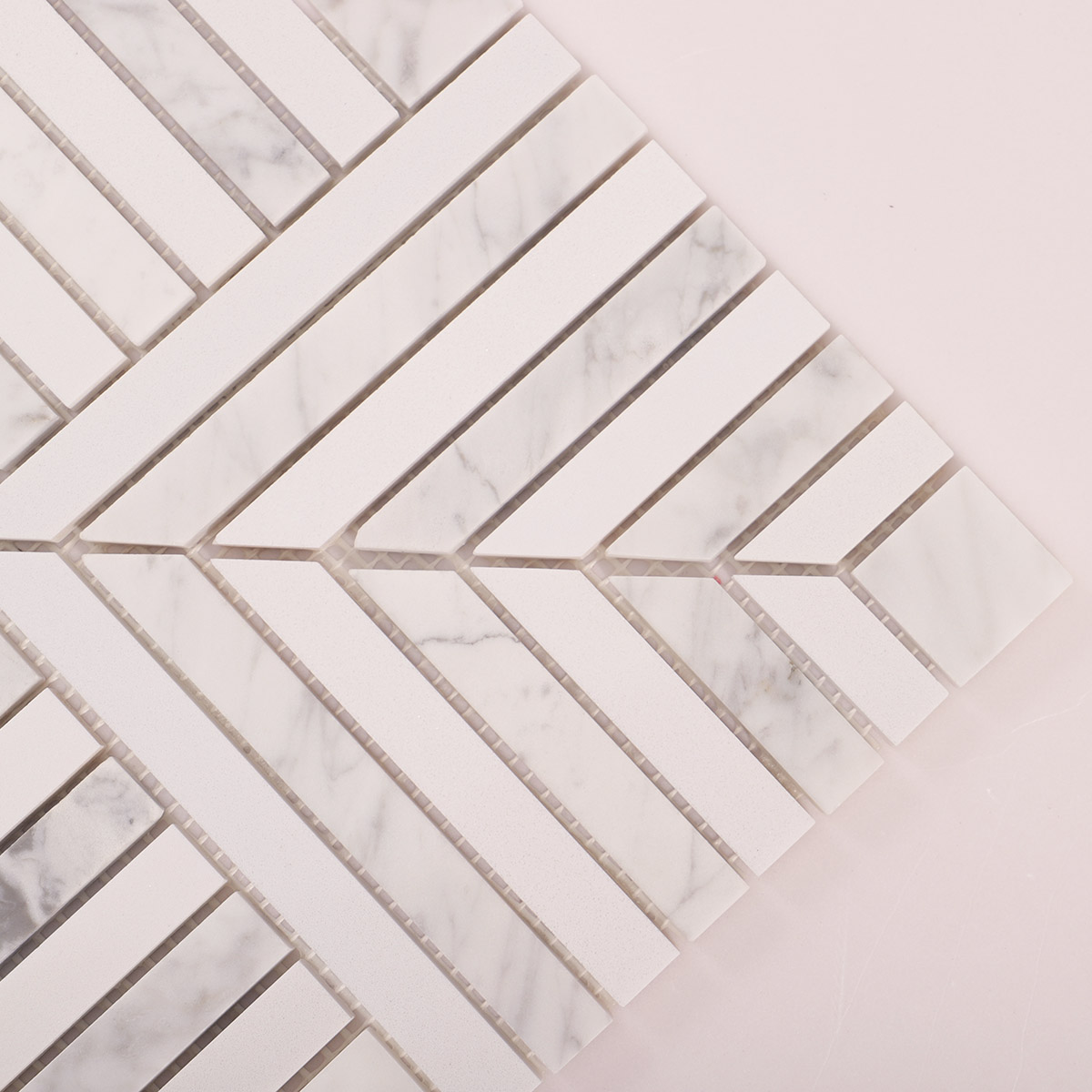 Close-up of white geometric marble mosaic tiles