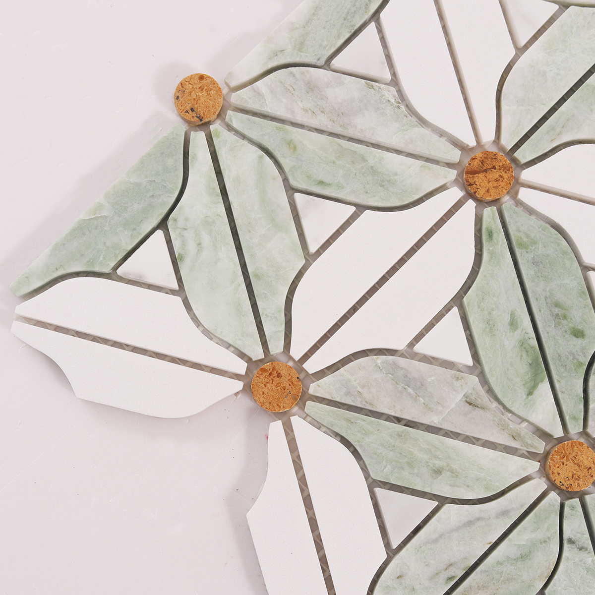 Close-up of black and white flower marble mosaic tiles.