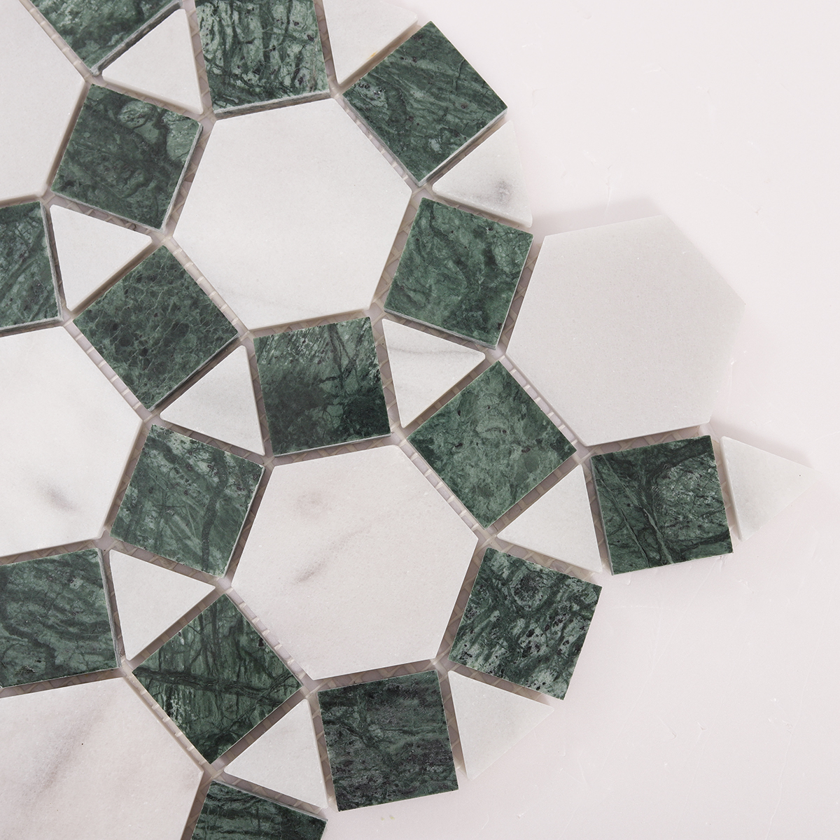 Close-up of hexagon and square green sunflower ring marble mosaic tiles