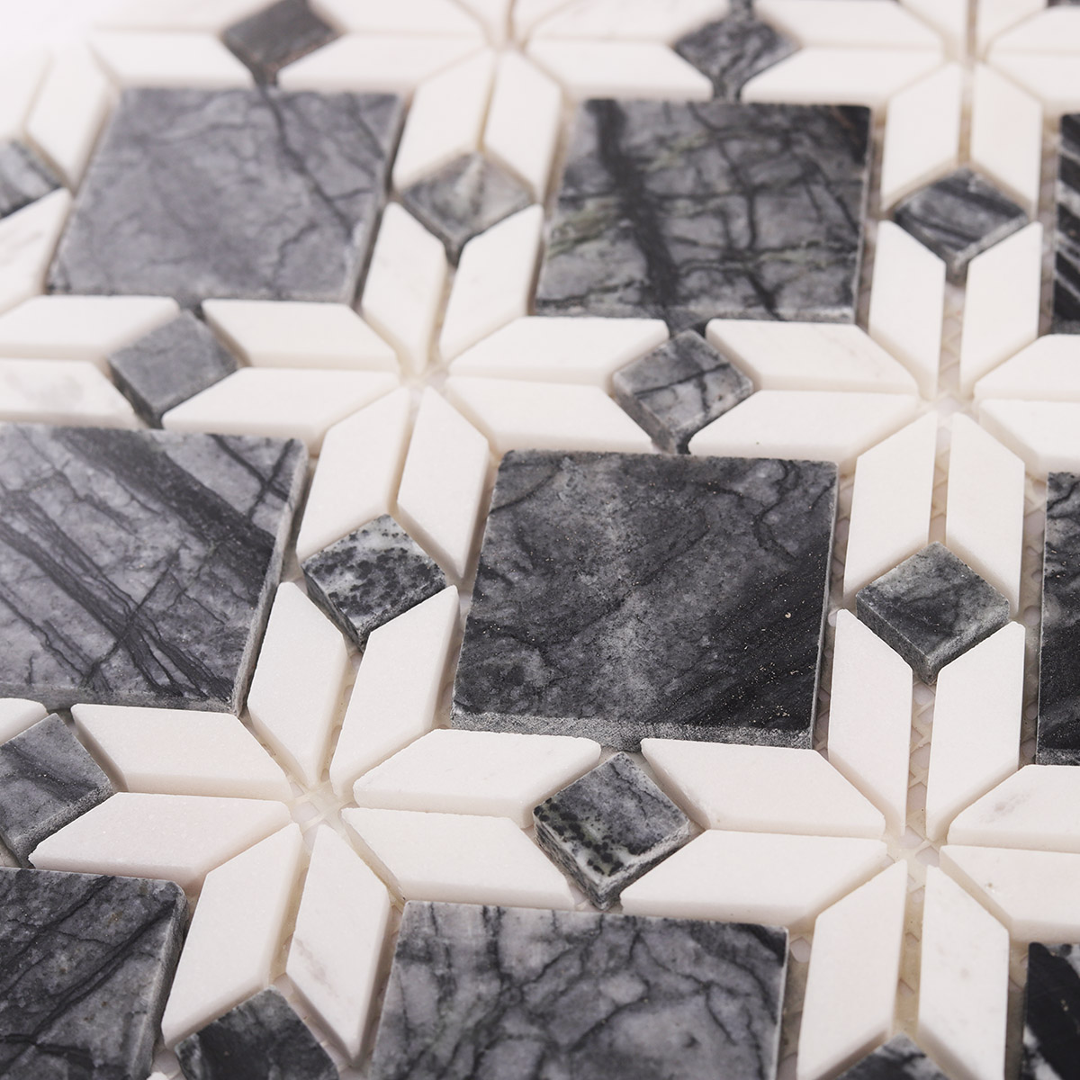 Close-up view of Floral Pattern Gray and White Marble Mosaic Tiles.