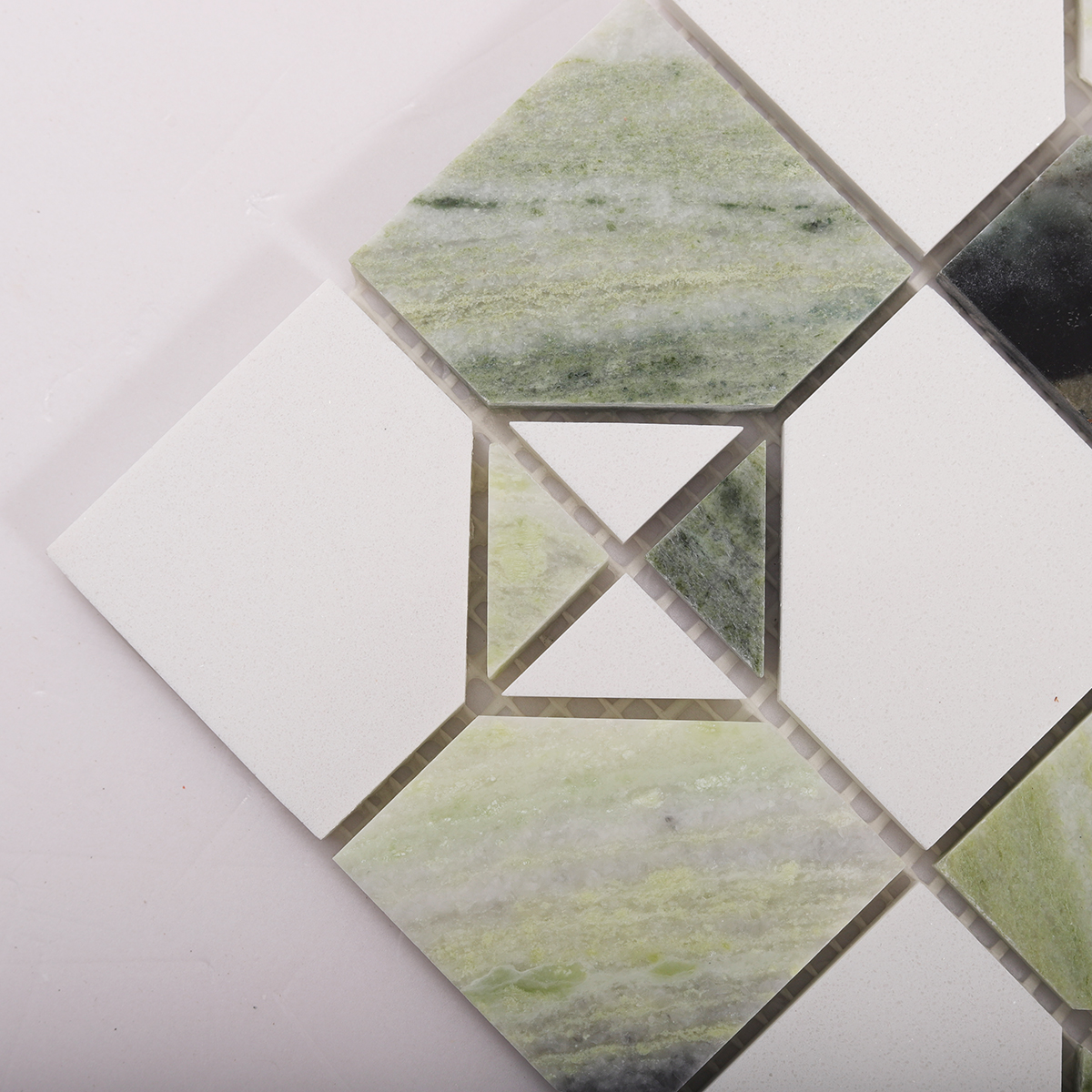 Detailed close-up of Ming Green & White Marble Honed Mosaic Tiles.