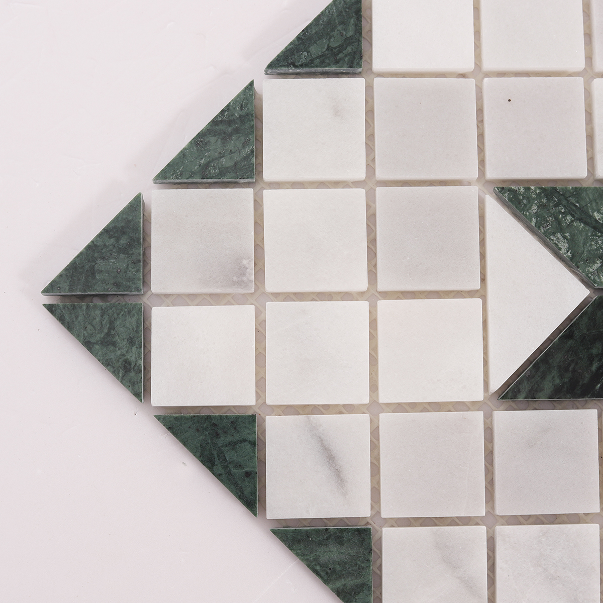 Close-up of Carrara White & Green Star Marble Mosaic Tiles