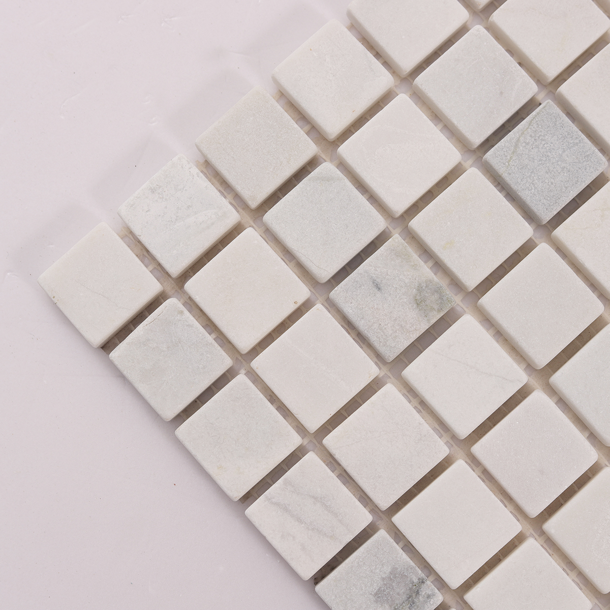 Close-up of Thassos White Square Marble Mosaic Tiles