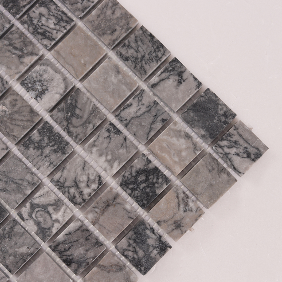 Macro close-up of Bardiglio Gray Square Marble Polished Mosaic Tiles