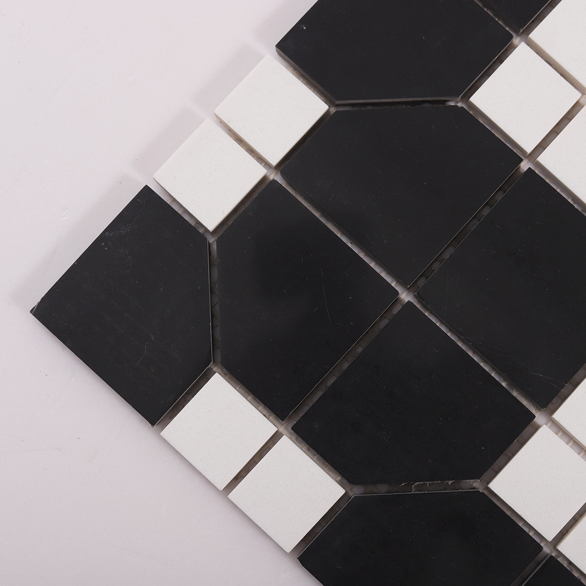 Close-up of Black and White Hexagon Geometric Marble Mosaic Tiles