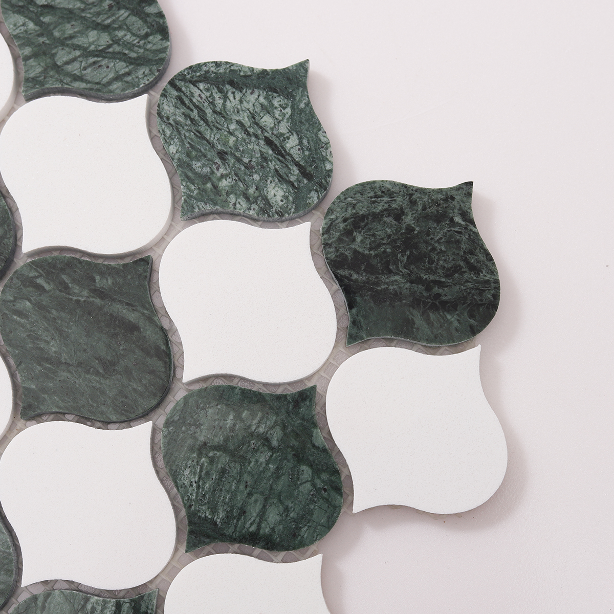 Close-up of Green and White Arabesque Lantern Marble Mosaic Tiles