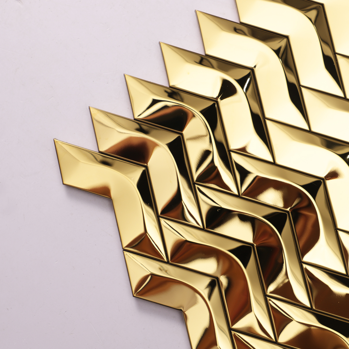  Close-up of 3D Gold Herringbone Mirror Stainless Steel Mosaic Tile, texture detail
