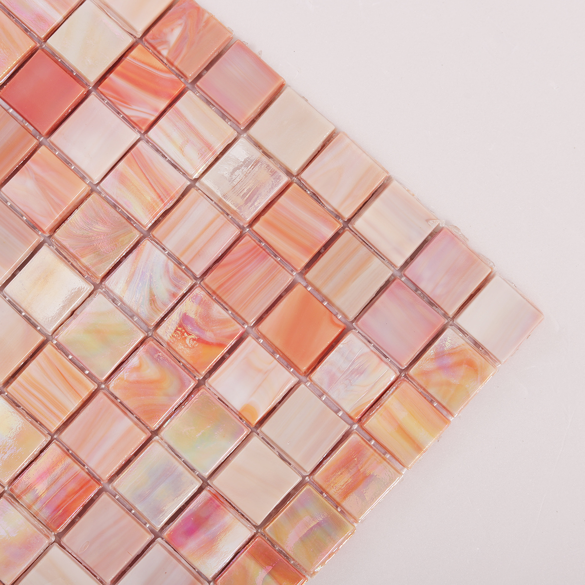 Detailed view of Pink Polished Glass Mosaic Floor Tiles, showing polished surface