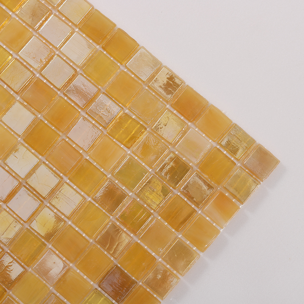Close-up of Glimmer Translucent Yellow Square Glass Mosaic Tiles, texture detail