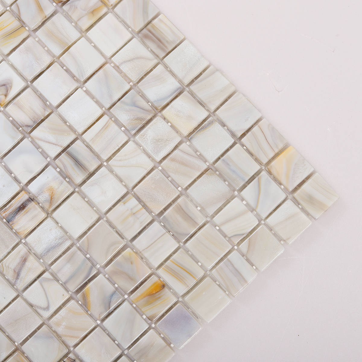 Close-up of Glass Square Mosaic Gray Beige Tile, texture detail