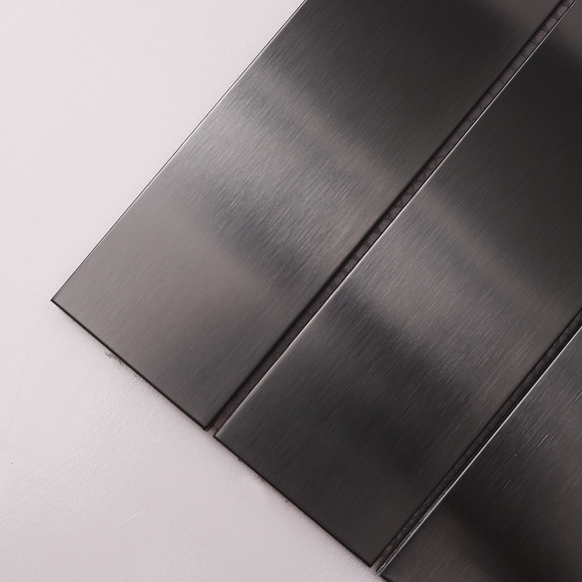  Close-up of Black Rectangle Metal Stainless Steel Mosaic Tiles, texture detail