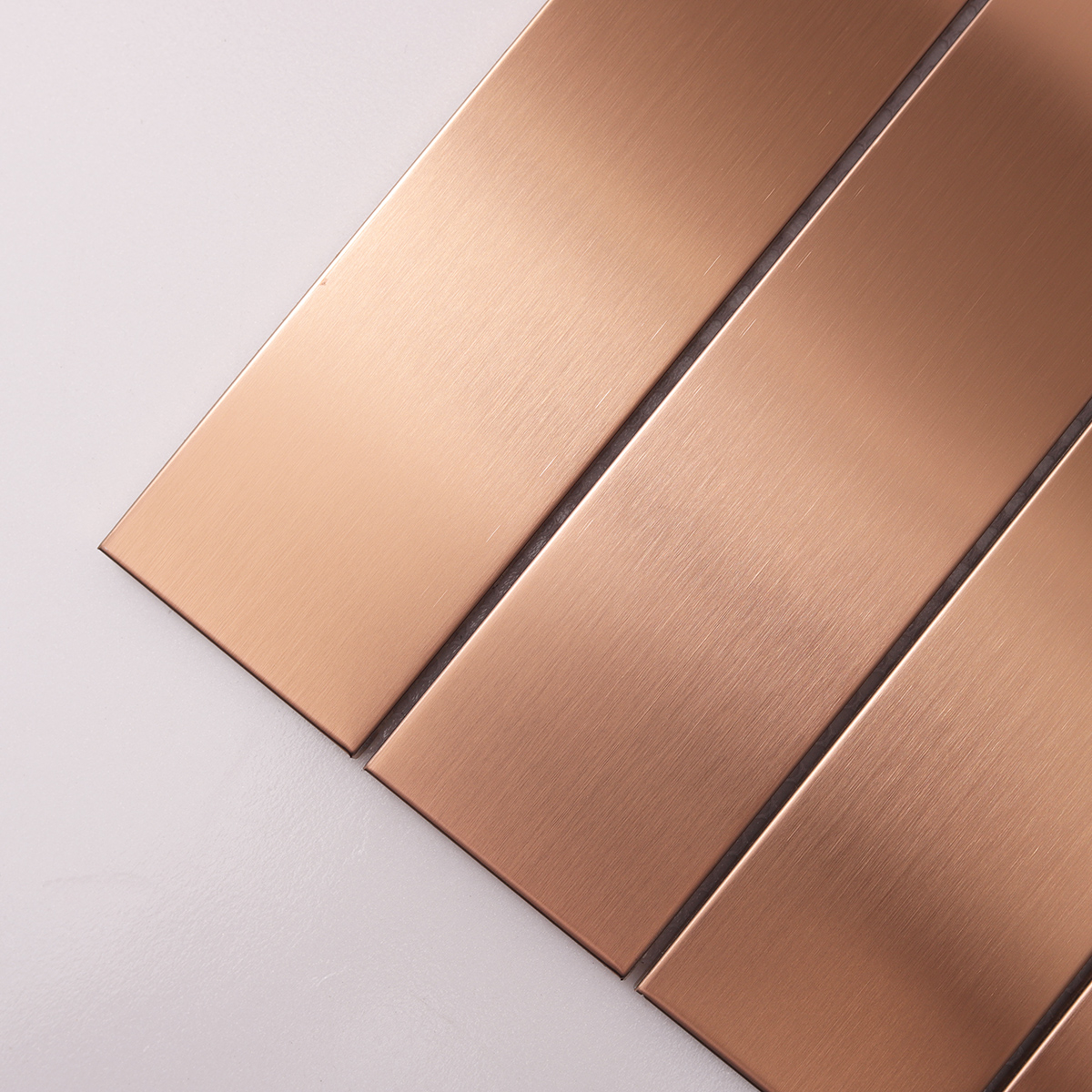 Close-up of Rose Gold Copper Metallic Vertical Mosaic Tile, texture detail