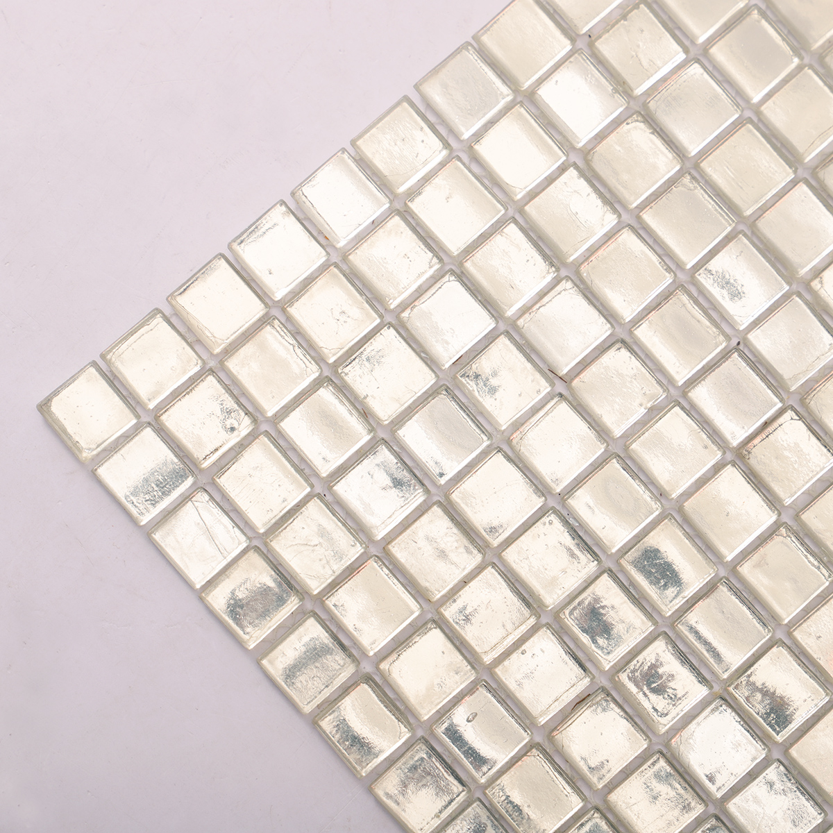 Close-up of Silver Foil Square Glass Mosaic Wall Tile, showing detailed foil texture