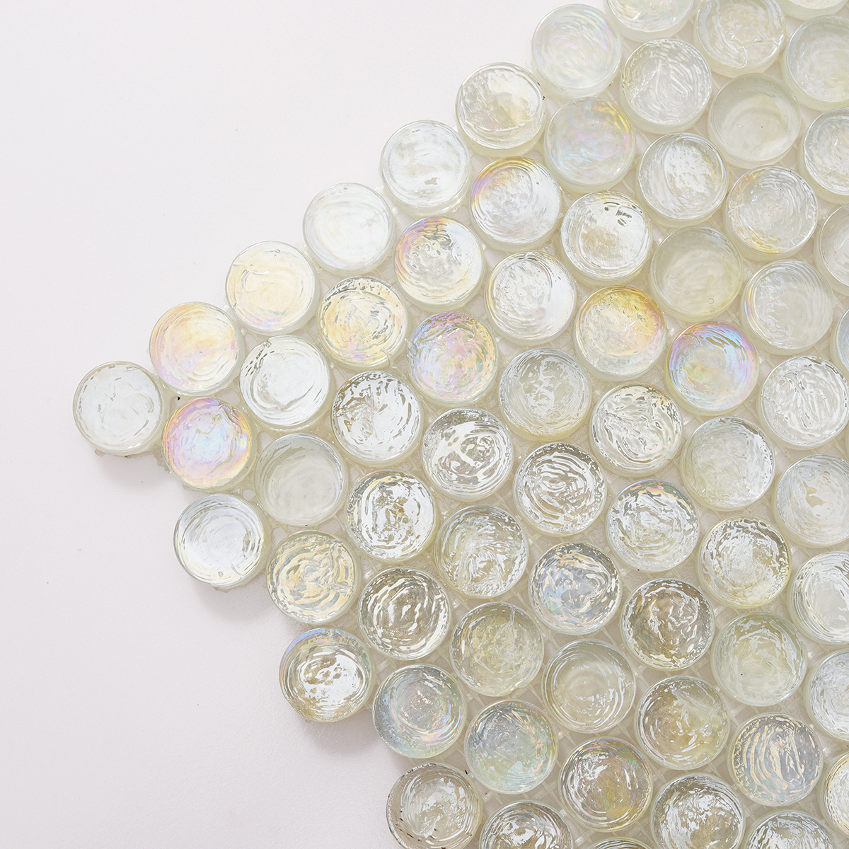 Close-up of White Iridescent Penny Round Glass Mosaic Tile, showcasing reflective surface