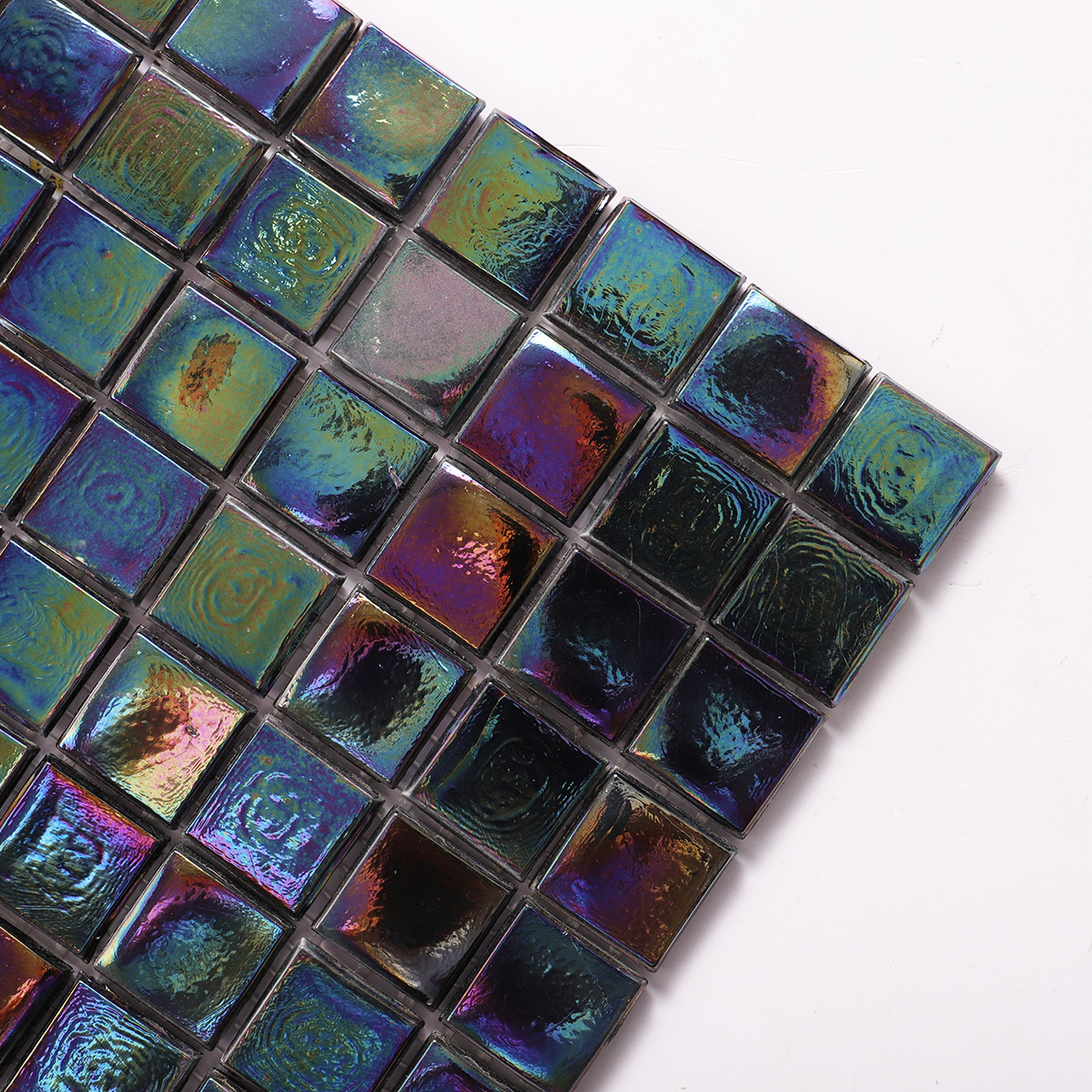 Close-up of Black Square Iridescent Glass Mosaic Wall Tiles, showcasing reflective surface