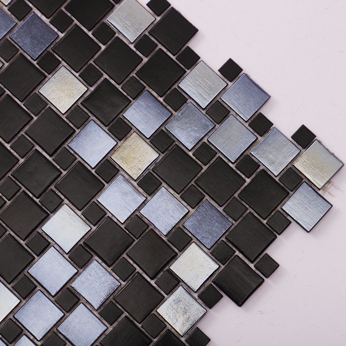 Side view close-up of Windmill Pattern Black Glass Mosaic Tile