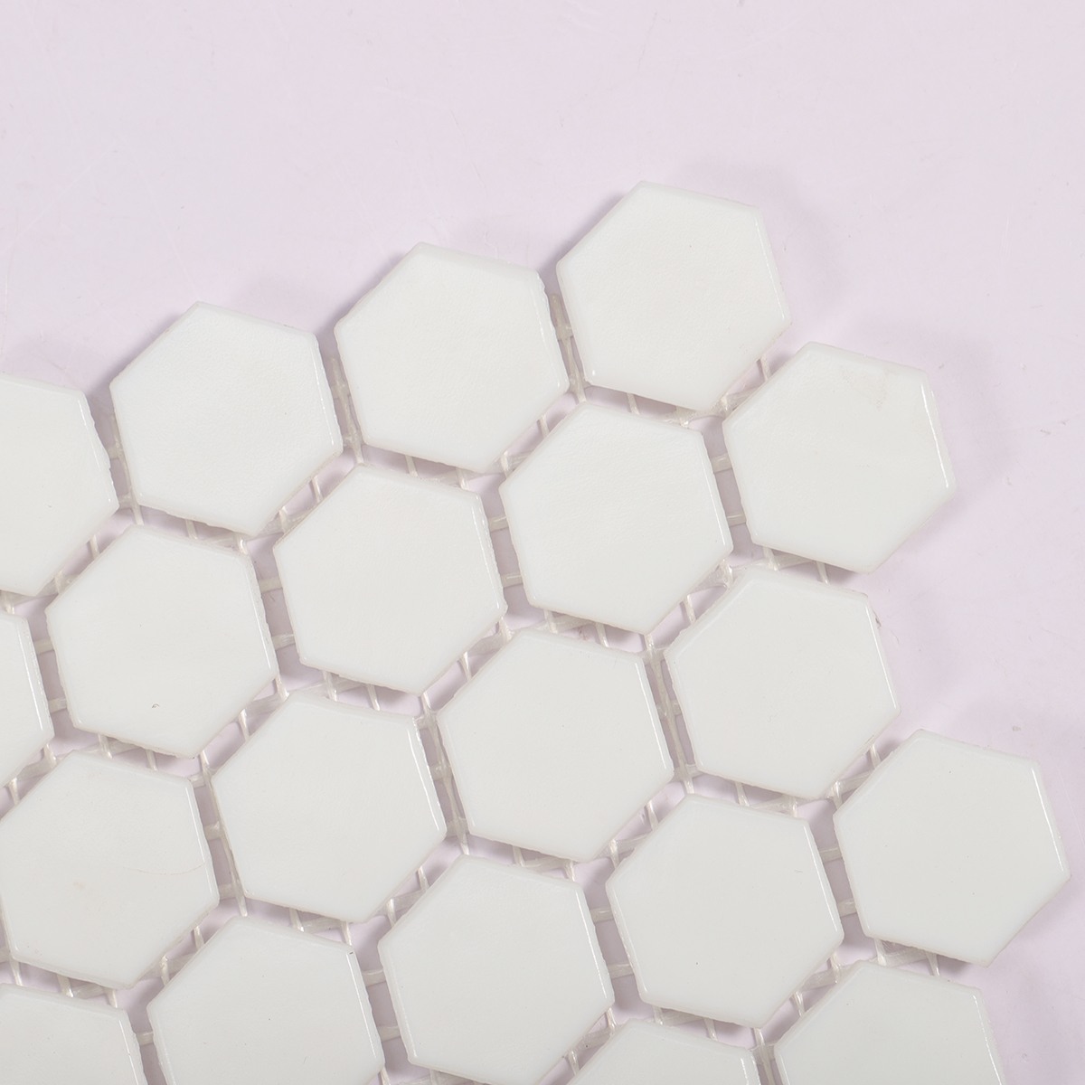 Side view close-up of White Hexagon Glass Mosaic Tile