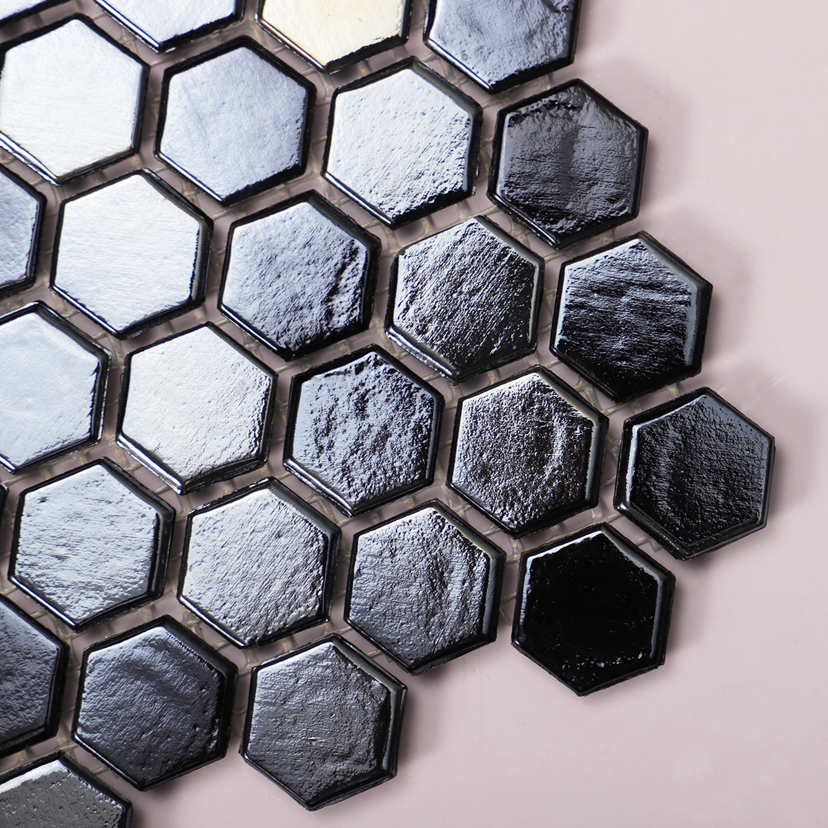  Close-up of Black Polished Honeycomb Glass Mosaic Floor Tile, showcasing glossy texture