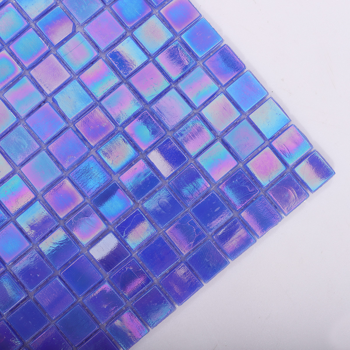 Close-up of Reactive Blue Iridescent Glass Mosaic Tile Surface