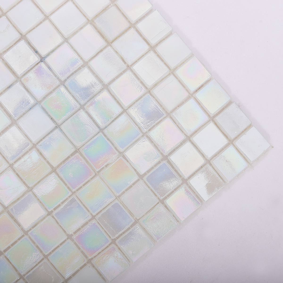 Close-up of White Iridescent Glass Rainbow Mosaic Tile Surface