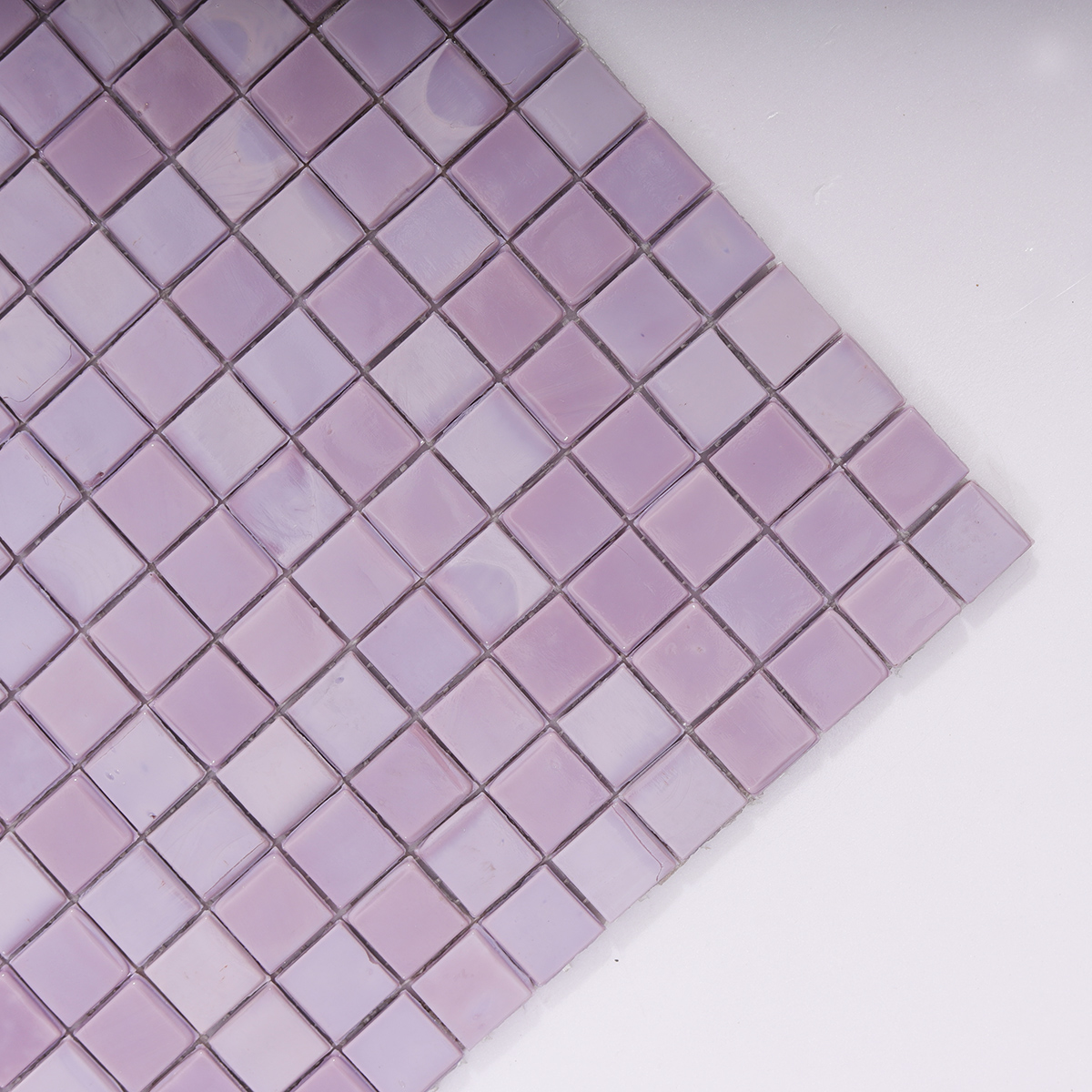 Close-up of Purple Glass Mosaic Wall Tile Surface