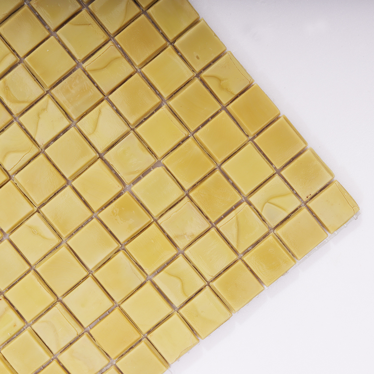 Close-up of Vintage Yellow Glass Mosaic Tile Surface