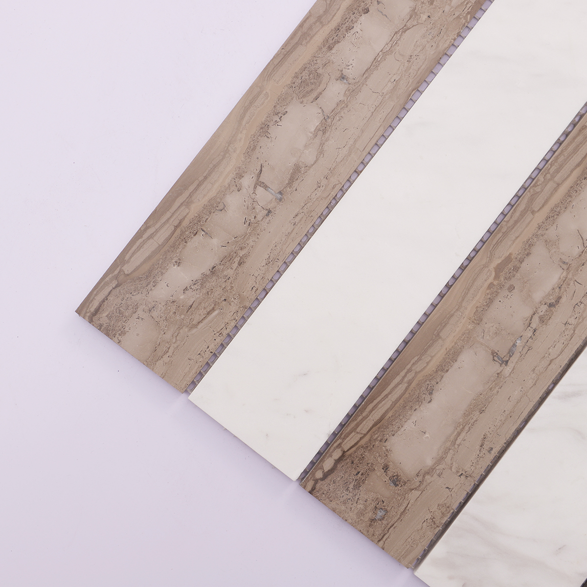  Close-up of beige marble mosaic tiles, focusing on surface details