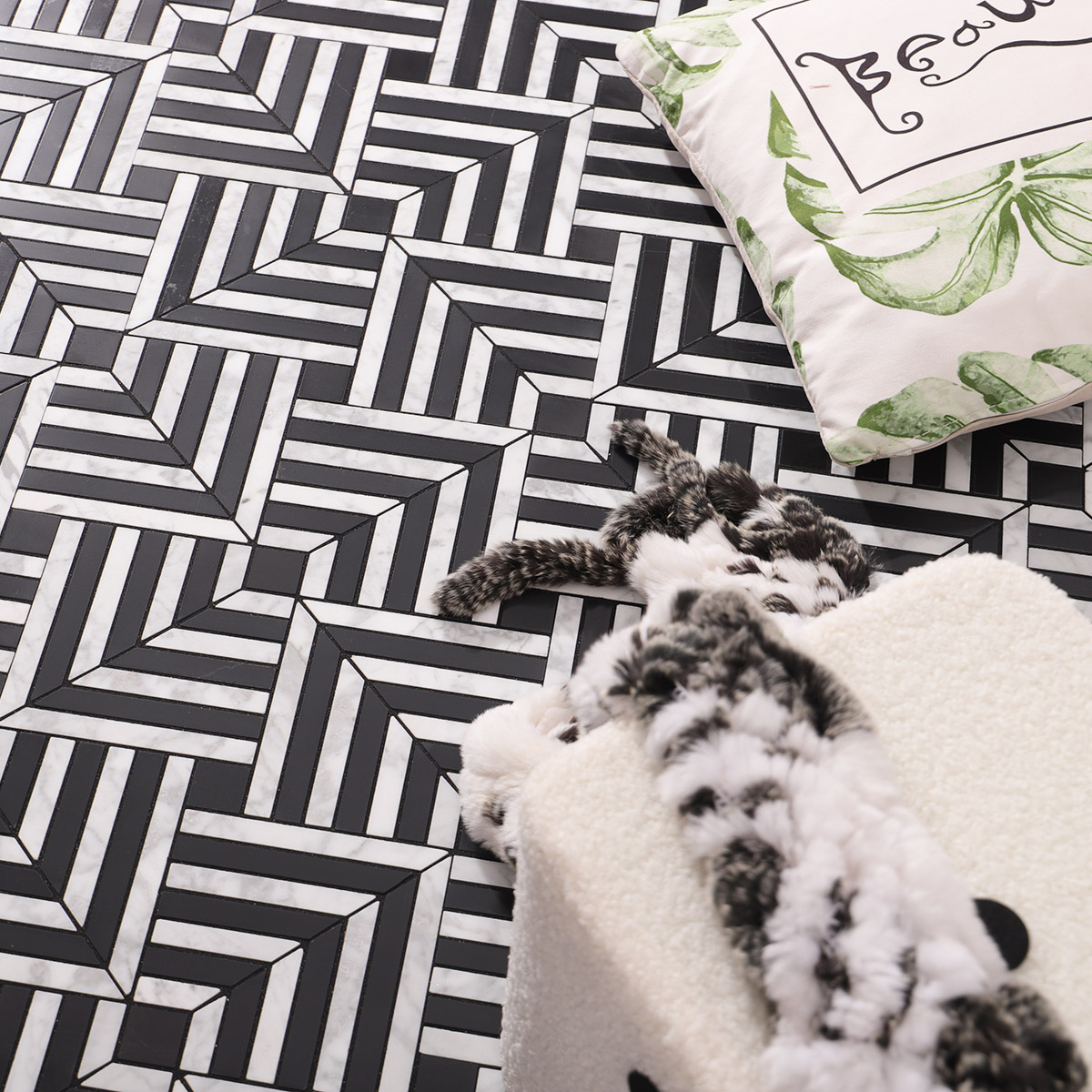 Stylish modern geometric pattern in black and white mosaic tiles with a cozy atmosphere.