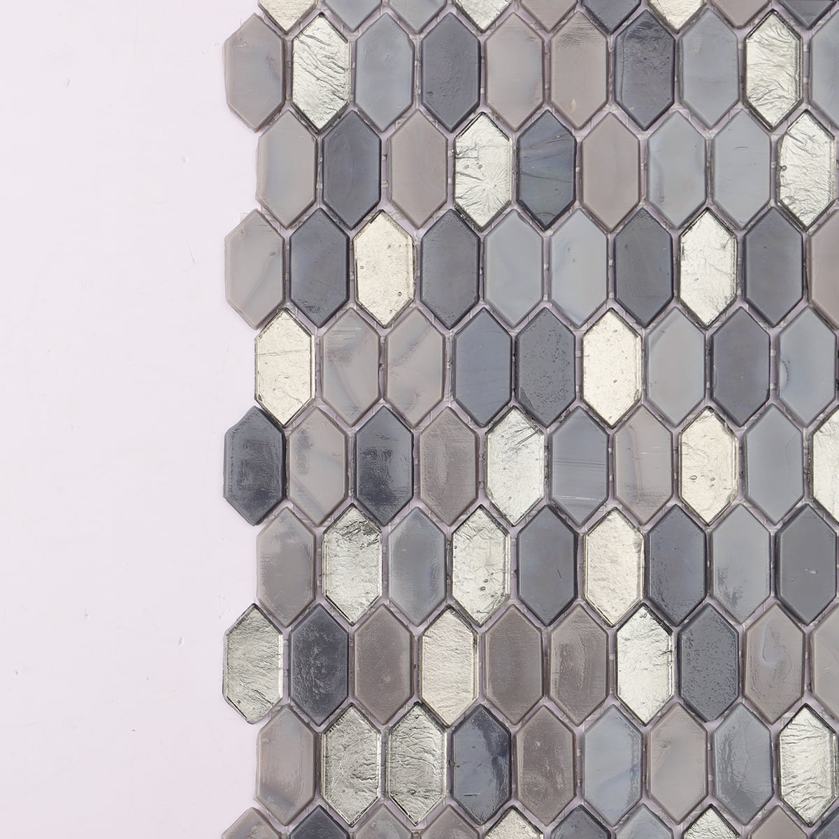 Detailed view of hexagonal mosaic tiles with metallic and gray tones