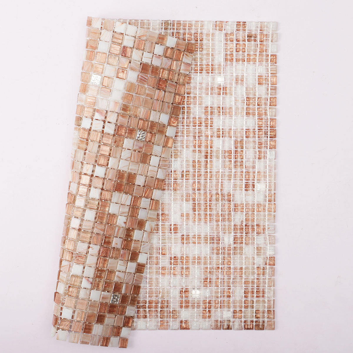 Back side of mini square glass mosaic tile with 24K platinum, folded.