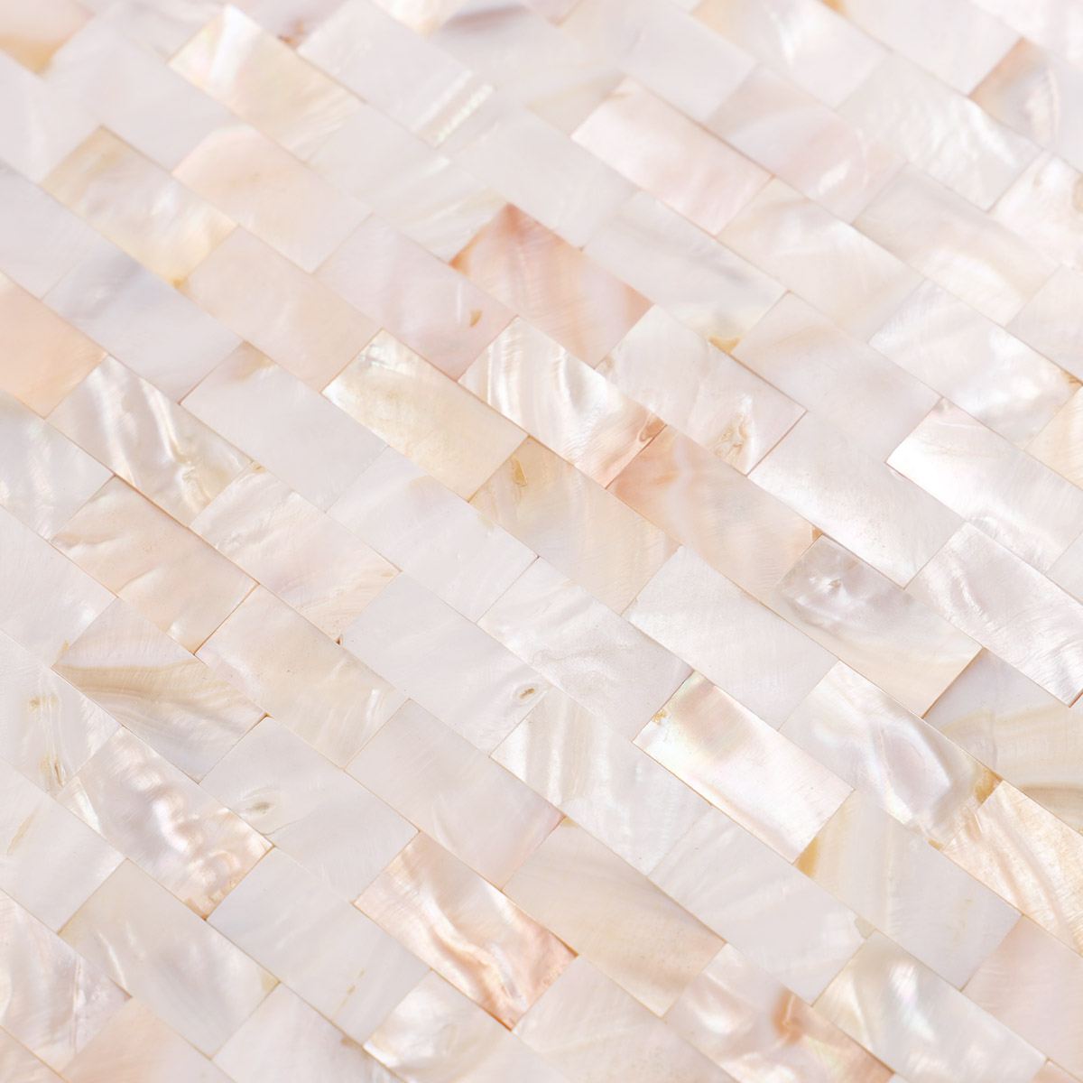  close-up of tight joint mother of pearl subway tiles