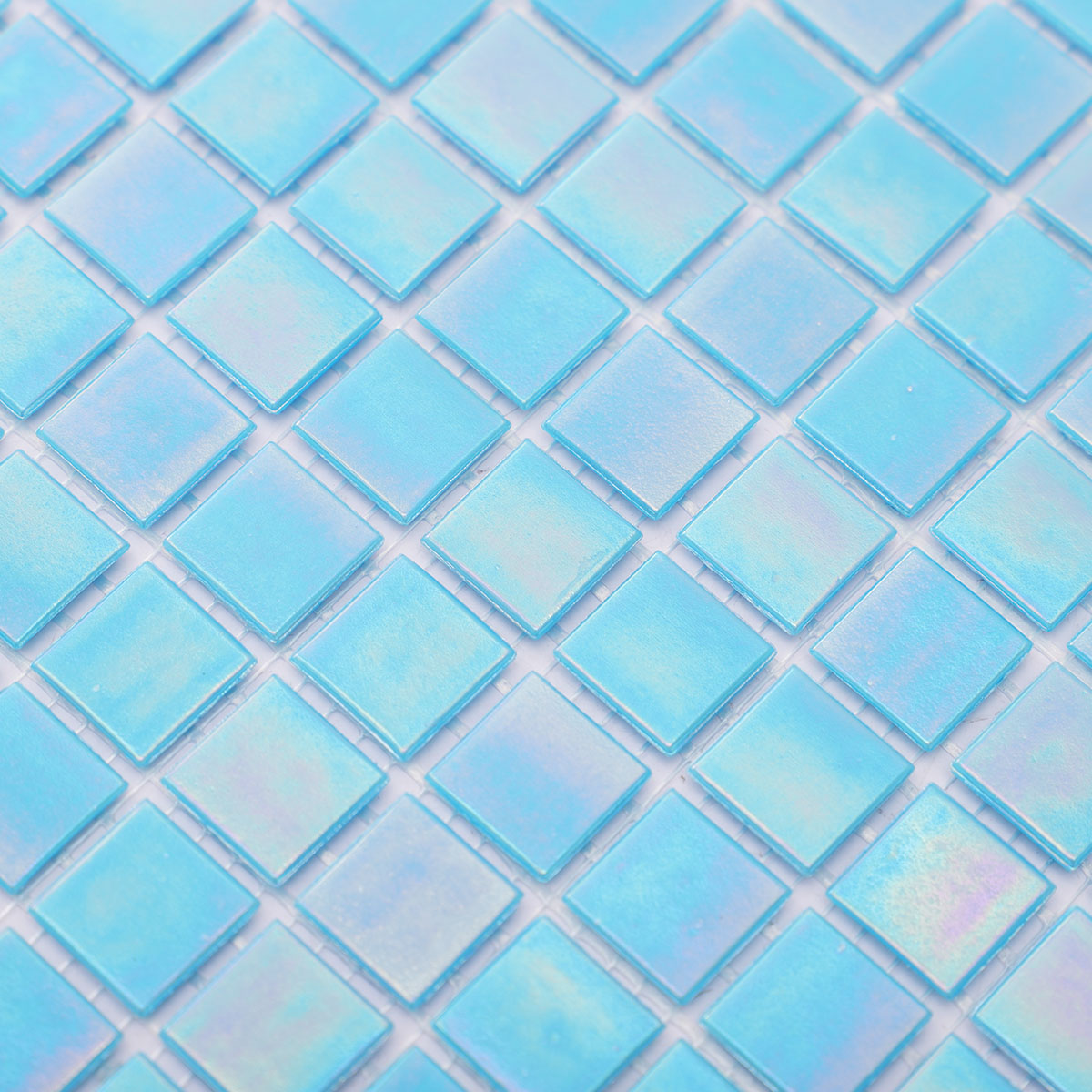 Close-up of iridescent sky blue square glass mosaic tiles