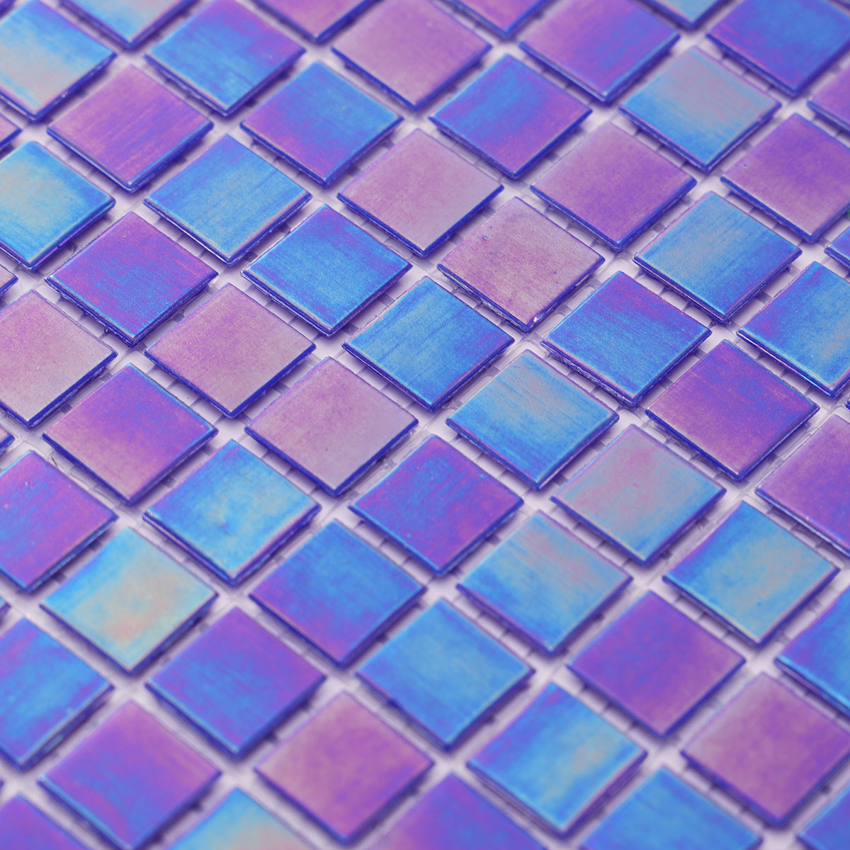 Close-up of the middle section of cobalt blue iridescent square glass mosaic tiles