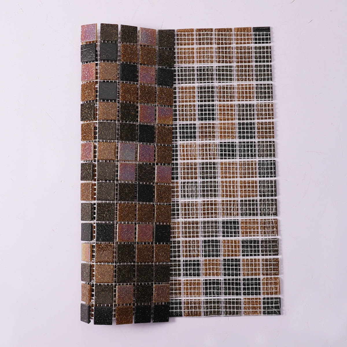 Folded back side of brown and black mixed square glass mosaic tiles