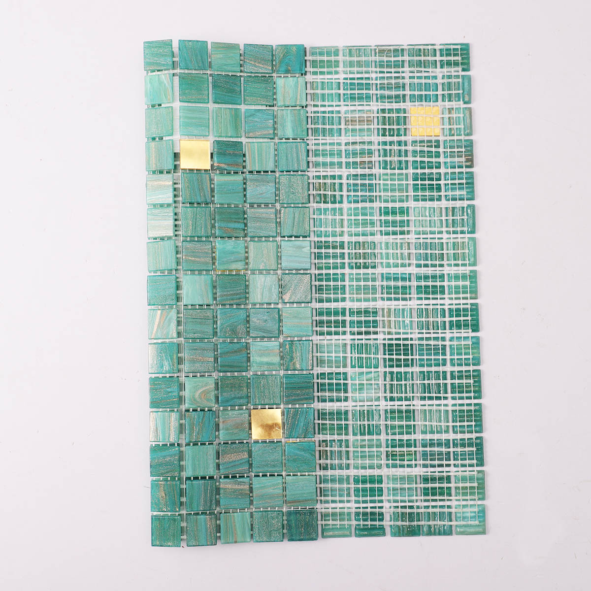 Green and gold glass mosaic tiles folded back side